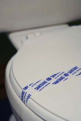 Bande hygiénique pour siège de toilette d'hôtel